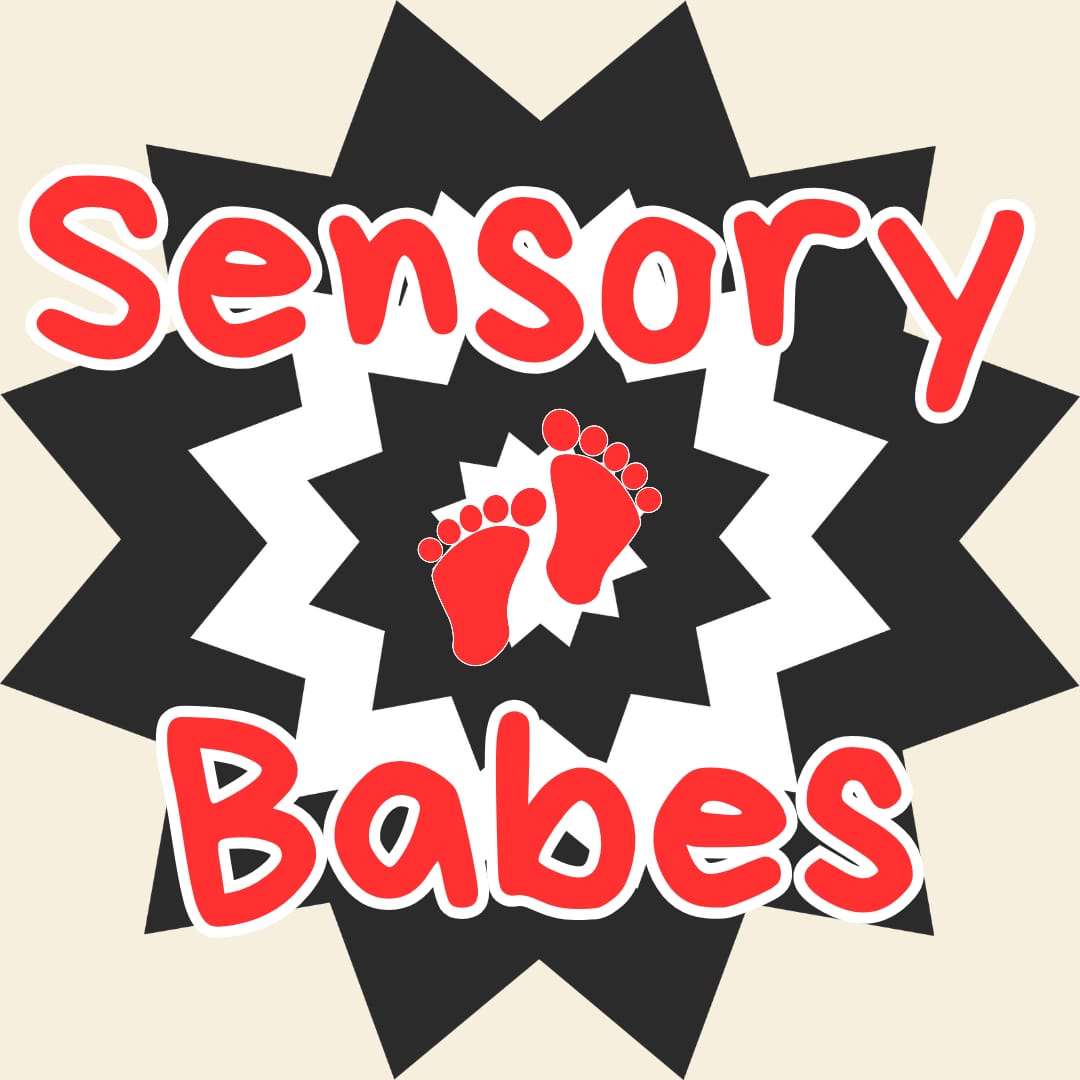 **Alternative text:** Graphic logo with the words “Sensory Babes” in large red letters with a white outline. Two red baby footprints appear in the centre over a black and white starburst design on a light beige background.